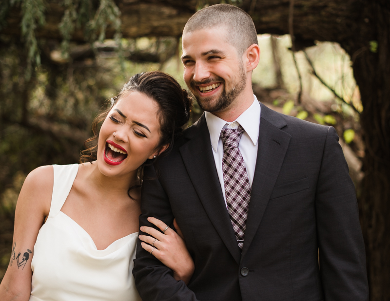 Couple laughs together during their portraits at Ballenger Farm in Hamilton, Virginia